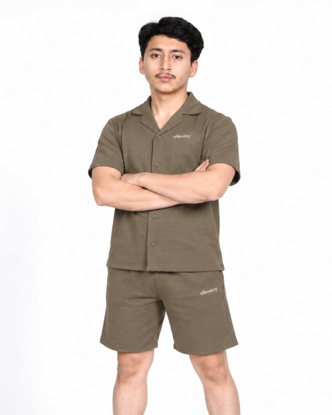 Boy standing wearing loungewear of olive green
